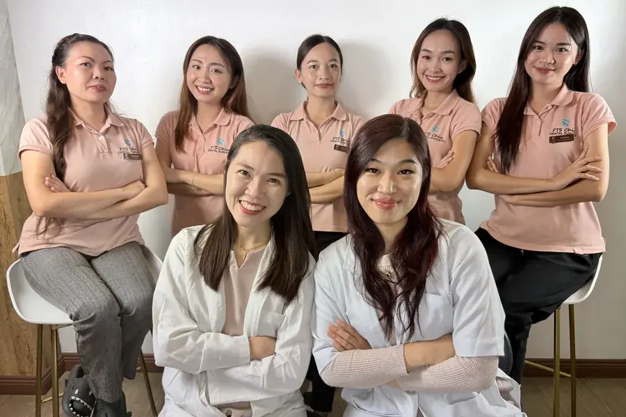 The FTS Chin Dental team seated together at the clinic in Likas, Kota Kinabalu