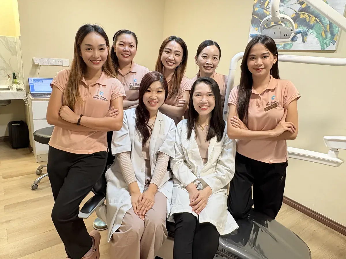 The FTS Chin Dental team in a treatment room at the clinic in Likas, Kota Kinabalu