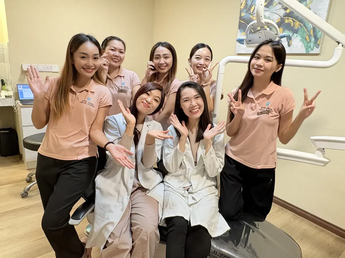 FTS Chin Dental's team in one of the clinic's treatment rooms in Likas, Kota Kinabalu