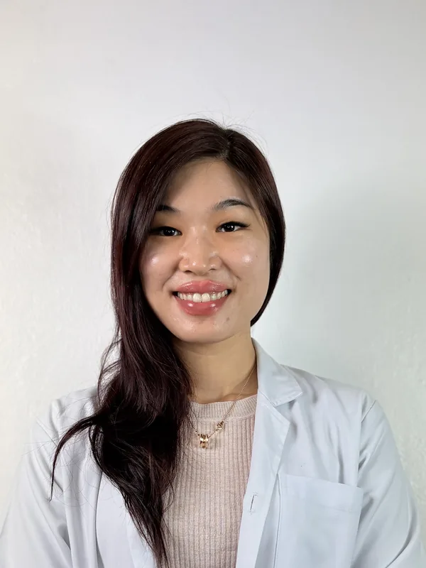 Portrait of Dr. Esther Tan, Principal Dentist & Clinic Manager at FTS Chin Dental